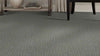 Dark grey textured carpet. 