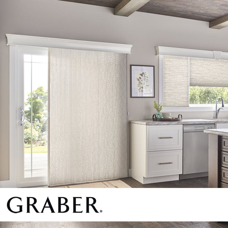 Modern gray Graber vertical blinds in a gray kitchen and main living space.