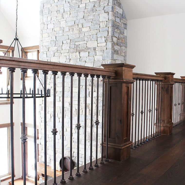 custom wood railing, with iron ballusters by Modern Millwork