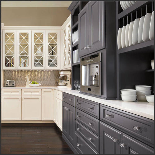 Beige and dark grey kitchen cabinets in a kitchen designed by Interiors by Modern Design, at Standard Paint & Flooring in West Valley Yakima.