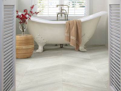 Room Image of Shaw Floors Glee Chevron Style Ceramic Solutions flooring in the color Yadkin River Hickory available at Standard Paint and Flooring.